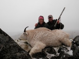 Hunters with mountain goat