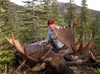 hunter with moose
