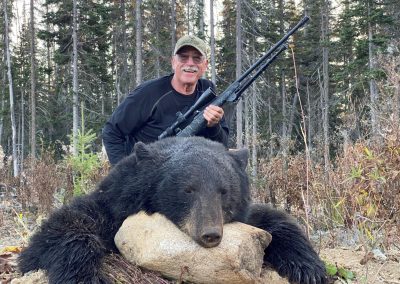 Hunter with his bear
