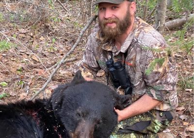 hunter with bear