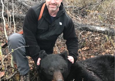 Hunter with bear