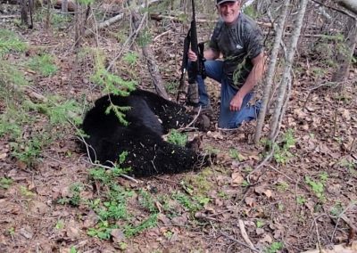 Hunter with Bear