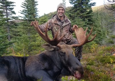 Hunter with trophy moose