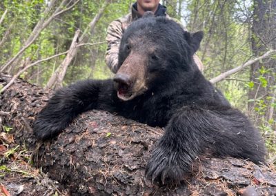 Hunter with Bear in Canada