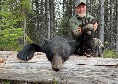Hunter with Bear in Canada