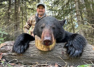Hunter with Bear in Canada
