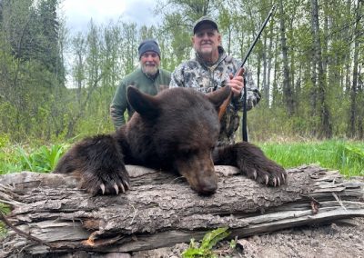 Hunters with Bear in Canada