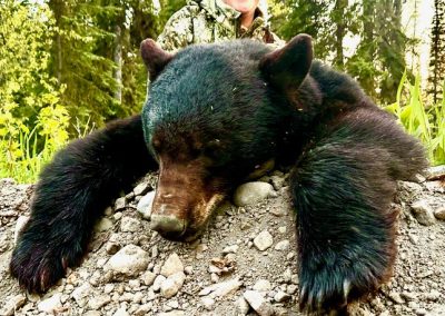 Hunter with Bear in Canada