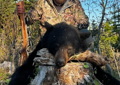 Hunter with Bear in Canada